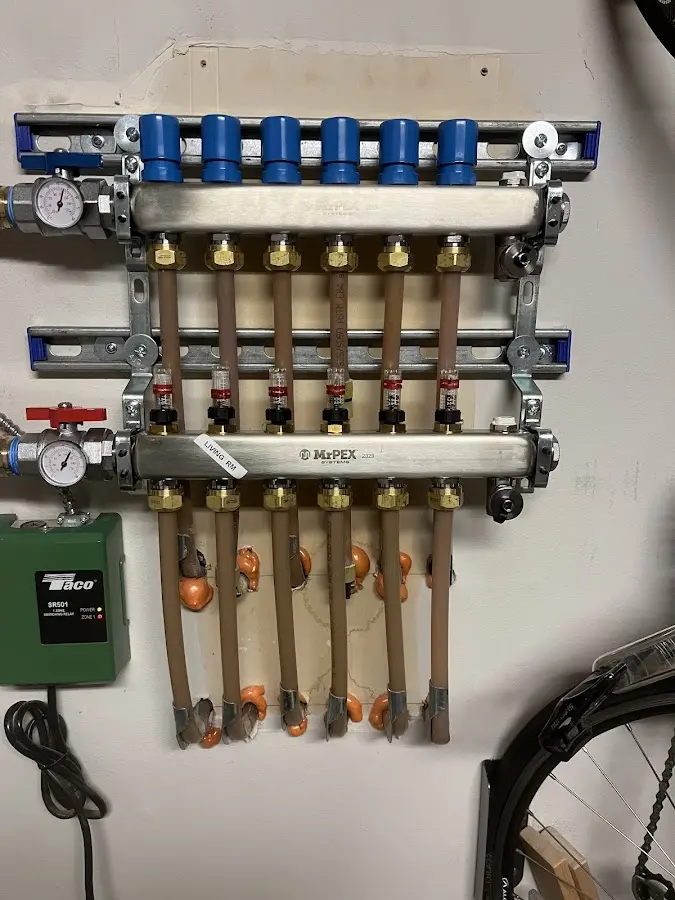 Plumber performing Leak Detection at a residential property in Natick